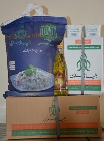 توزیع سبد غذایی بین مادران باردار در کوار توزیع سبد غذایی بین مادران باردار در کوار